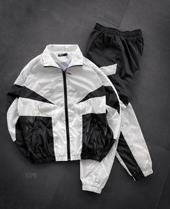 Conjunto de Chaqueta y Pantalones Deportivos Cortavientos para Hombre, Diseño Personalizado, Ropa Deportiva Ligera para Correr, Atuendo Informal para Entrenamiento en el Gimnasio - Product Image 1