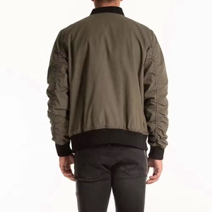 olive-green cotton bomber <b>jacket</b> features a classic black ribbed collar and a convenient utility <b>zipper</b> <b>pocket</b> on the left - Product Image 2