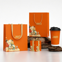Emballage cadeau de luxe en papier blanc et orange avec accents dorés coordonnés pour le branding de marques haut de gamme de thé et de café, idéal pour les supermarchés