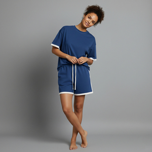 Nouvel ensemble court pour femme en coton 100% uni, coupe régulière, respirant, avec dentelle brodée, idéal pour l'été - Product Image 1