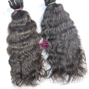 ผมแท้แบบพรีเมียม เกรด Remy  จัดเรียงเส้นผมอย่างดี 100%  แบบดิบธรรมชาติจากวัดอินเดีย  ต่อแบบ Double Weft สีดำธรรมชาติ  แบบลอน - Product Image 1