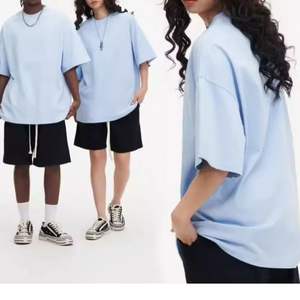 Nouvelle Tendance Vente en Gros Chemise Homme Oversize 100% Polyester Manches Courtes Épaules Tombantes Hip Hop Streetwear Personnalisé de Haute Qualité - Product Image 1