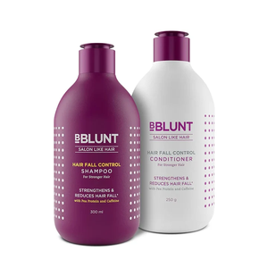 Strengthening <b>shampoo</b> <b>and</b> <b>conditioner</b> set with pea protein <b>and</b> caffeine designed to reduce <b>hair</b> fall <b>and</b> improve <b>hair</b> resilience - Product Image 1