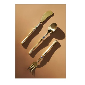 Ensemble de couverts en acier inoxydable de luxe unique avec des poignées lisses et arrondies pour une expérience culinaire confortable - Product Image 1