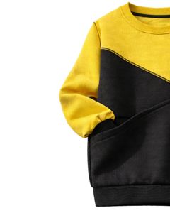 เสื้อสเวตเชิ้ตผู้หญิงสีเหลืองและดำแบบคัลเลอร์บล็อก ผ้าฟลีซนุ่ม คอกลม สวมใส่สบาย เหมาะสำหรับฤดูหนาว อุ่นสบาย ทันสมัย - Product Image 3