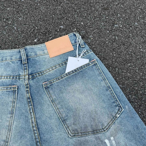 Jean en denim déchiré taille haute à jambe large, coupe ample en coton, style décontracté pour le printemps, avec marque privée - Product Image 5