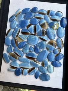 Opales bleues les plus vendues, pierres naturelles lisses et polies pour la fabrication de bagues, boucles d'oreilles, pendentifs et bijoux, disponibles en gros. - Product Image 1