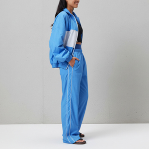 OEM/ODM custom screen printed logo 2 tone women's tracksuit 100% nylon Streetwear baggy fit 2 tone hip hop ladies 2 piece <b>set</b> - Product Image 4