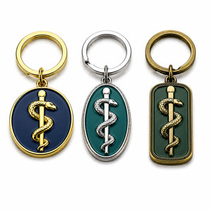 Porte-clés personnalisés classiques en alliage de zinc, breloques serpents et baguettes de médic moulées sous pression, durables, légers, émaillés, vente en gros OEM |   Audité par Sedex - Product Image 1