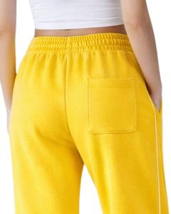 Pantalon de jogging ample jaune pour femme en molleton avec passepoil latéral, taille élastique et cordon de serrage, coupe décontractée, idéal pour la détente - Product Image 5
