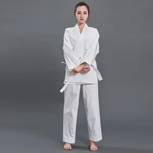 Uniforme de karaté bleu 100% coton pour adulte unisexe, durable, teinture unie, coupe ample, taille élastique, 140g, ceinture blanche incluse, logo au dos et au col - Product Image 2