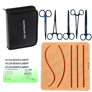 Kit de Sutura, Instrumento Médico, Kit de Práctica de Sutura para Estudiantes de Medicina, Kit Completo de Entrenamiento Quirúrgico con Almohadilla de Piel para Suturas y Herramientas - Product Image 1