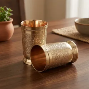 Traditional Chinese Embossed Metal Drinking Cups Set Of 2 Gold Finish Decorative Serving Glasses - Product Image 1