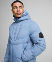 Veste matelassée à capuche bleu clair pour homme avec design patchwork, fermeture éclair, coupe-vent, vêtement décontracté d'hiver, coupe régulière, polyester épais