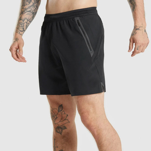 Shorts de sport noirs pour hommes avec poches zippées, séchage rapide, taille élastique, couleur unie, pour fitness, course et entraînement - Product Image 1