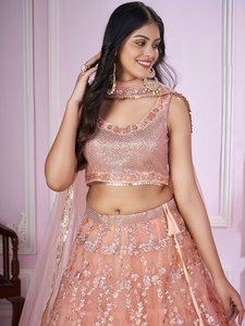This peach pink lehenga choli blends soft elegance with heavy embroidery Perfect for creating a dreamy festive look - Product Image 5
