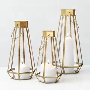 Modern <b>Brass</b> <b>Lantern</b> Set with Geometric Design for Home Decoration Heat Resistant Candle Holder Gold Finish - Product Image 1