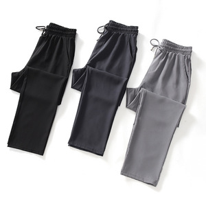 Pantalon de survêtement pour homme à taille élastique avec cordon de serrage, poches latérales, léger, respirant, en spandex et polyester, idéal pour l'automne - Product Image 1