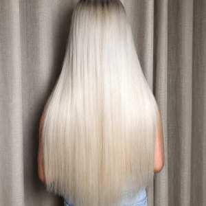 Perruque en cheveux brésiliens Remy de marque premium, teinte blanc argenté élégante, aspect naturel, texture douce, finition lisse, confortable - Product Image 1