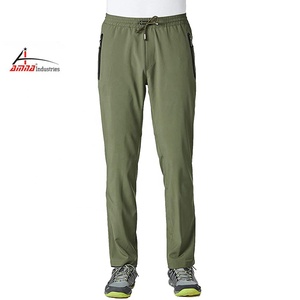 Pantalon de survêtement en nylon pour hommes, personnalisé, 100%, pantalons coupe-vent avec fermeture éclair élastique, vente en gros - Product Image 1