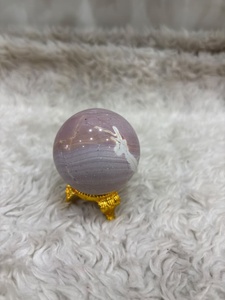 ลูกบอลหยกไฮยาซินธ์สีเทอร์ราคอตต้าโทนอุ่น พร้อมลวดลายแร่ธาตุที่ซับซ้อน ผิวเรียบกลมมน และมีลักษณะตกแต่งที่โดดเด่น - Product Image 3