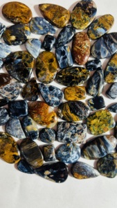 พลอยบลูพีเตอร์ไซต์เกรดท็อป รูปทรงคาโบชอง ลายธรรมชาติ พร้อมเอฟเฟกต์ไฟ  ขายส่งจำนวนมาก พลอยพีเตอร์ไซต์หลายสี - Product Image 6