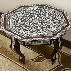 Mesa de centro octogonal con incrustaciones geométricas de estrellas en nácar, disponible a precios de mayorista. - Product Image 1
