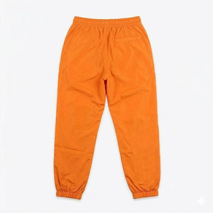 Nuevas llegadas: Conjuntos de pantalones cortavientos de nailon de alta demanda para hombre, en naranja y blanco, con logotipo personalizado, para verano, conjunto de sudaderas con capucha estilo streetwear para hombre. - Product Image 5