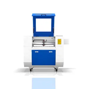 Machine de découpe laser co2 multifonctionnelle 600*400mm pour la gravure de découpe de non-métaux avec refroidisseur d'eau