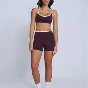 Nuevos conjuntos de yoga personalizados 2026: sujetador deportivo y leggings cortos por encima de la rodilla para mujer, ideales para fitness, gimnasio y entrenamiento, shorts de ciclista largos sin costuras. - Product Image 1