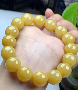 Bracelet classique en résine jaune à perles, bijoux de mode unisexe, forme de boule ronde, style élégant, disponible chez Worldwide Supply - Product Image 2