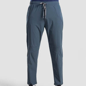 Pantalon de sport haute performance, matière extensible anti-humidité, idéal pour la course à pied, l'entraînement physique et un style de vie actif. - Product Image 1