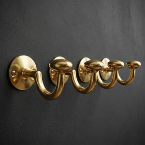 Handcrafted brass wall coat <b>hook</b> providing dependable storage assistance with elegant craftsmanship for modern interiors - Product Image 6