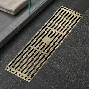 Desagüe de ducha rectangular moderno de bronce cepillado con rejilla extraíble y tapón desplegable - Product Image 5