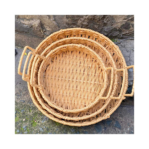 Colección Artesanal de Cestas y Bandejas de Ratán Tejido, Decoración Ecológica y Duradera - Product Image 1