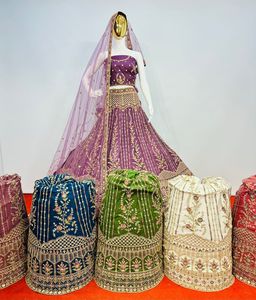 Lehenga Choli de mariée en tulle fascinant avec travail de pierres Jarkan complet, dupatta et chemisier de créateur, 10 designs exclusifs - Product Image 2