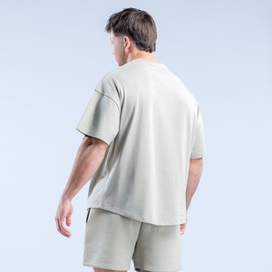 เสื้อยืดผู้ชายผ้าฝ้าย 100% สั่งทำโลโก้ขายส่ง ทรงโอเวอร์ไซส์ สวมใส่สบาย ระบายอากาศได้ดี เป็นมิตรกับสิ่งแวดล้อม ล้างแบบวินเทจ ให้ความรู้สึกสบาย - Product Image 3
