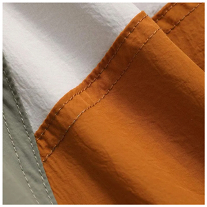 เสื้อแจ็คเก็ตมีฮู้ดสไตล์มินิมอลทันสมัย กันลม กันน้ำ แห้งเร็ว น้ำหนักเบา ทรงหลวม เหมาะสำหรับกิจกรรมกลางแจ้ง สไตล์ฮิปฮอป ตกแต่งด้วยผ้าแบบแพทช์เวิร์คสไตล์เกาหลี - Product Image 6