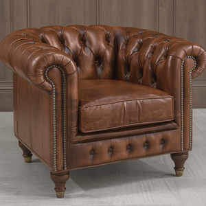 Fauteuil Chesterfield de luxe en cuir marron avec accoudoirs roulés et capitonnage profond, idéal pour salon, bureau ou hôtel - Product Image 1