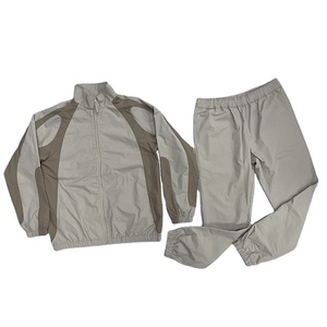 Chaqueta de nailon reflectante a prueba de viento con cremallera de alta calidad de talla grande y pantalones de chándal cortavientos para hombres - Product Image 1