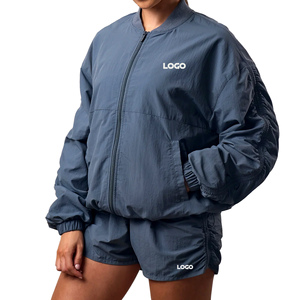 Ensemble short et blouson bomber femme deux pièces en tissu tissé imperméable écologique avec logo personnalisé Storm Blue, style streetwear, coupe ample, manches longues - Product Image 2