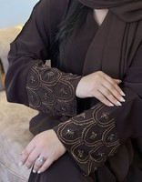 Abaya noire de luxe brodée avec des manches à fleurs et des perles, col haut, manches longues, style Dubaï, robe pour femmes