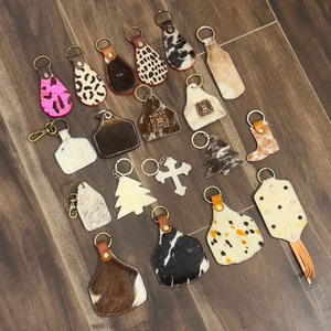 Nouveau porte-clés artisanal en cuir de vachette à poils, en forme d'étoile, style western, en cuir véritable, pour cowboy et cowgirl, avec motif vache - Product Image 2