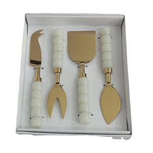 ชุดอุปกรณ์ชีสดีไซน์หรูหราสีทอง ด้ามจับเรซิ่น คุณภาพรับประกัน สำหรับงานแต่งงาน ขายดีทั่วโลก ในราคาที่คุ้มค่า - Product Image 1