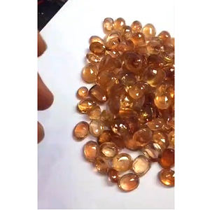 พลอยโทแพซธรรมชาติอิมพีเรียล 120 เม็ด ขนาด 10 มม. ถึง 15 มม. รูปทรงวงรี เจียระไน 830 กะรัต คุณภาพระดับขายส่ง ราคา US$249 ต่อชุด - Product Image 1