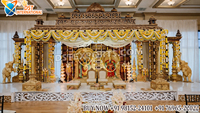 Piliers élégants de style fontaine pour Mandap de mariage hindou, décoration de scène de mariage luxueuse avec finition blanche et auvent floral circulaire