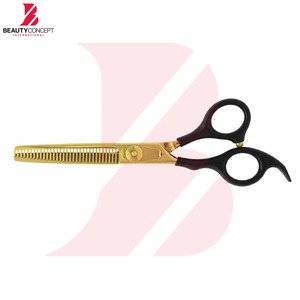 Últimas tijeras profesionales de peluquería con hoja chapada en oro y mango de plástico negro para texturizar el cabello - Product Image 3