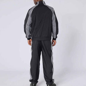 เสื้อแจ็คเก็ตกันลมวินเทจสำหรับผู้ชาย TITAN TREAD WEAR รุ่นคัสตอม พร้อมชุดเซ็ตแทรคสูทซอฟต์เชลล์ 2 ชิ้น แบบมีซิป ผ้าคอตตอน 100% คุณภาพสูง - Product Image 6