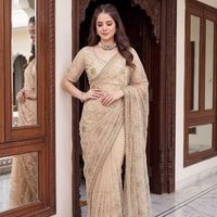 Sari en tissu filet élégant et haut de gamme avec broderies de perles, de sequins et de perles nacrées, et chemisier non cousu, prix de gros par Royal Export.