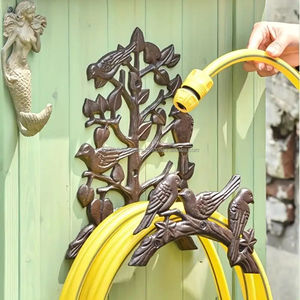 Support mural fonctionnel en fer pour tuyaux de garage, permettant de ranger les tuyaux proprement et en toute sécurité - Product Image 1